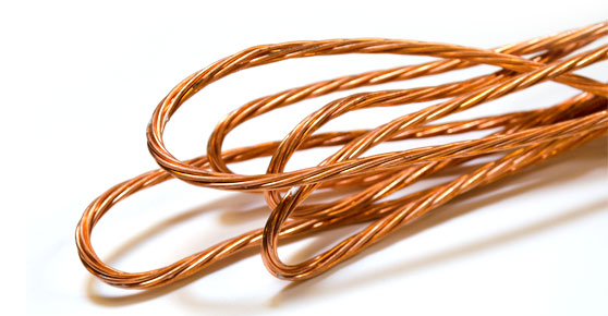 Bright and Shiny Copper - Shiny copper wire on white backdrop