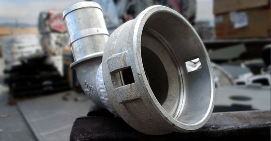 Aluminum Cast - Close-up of aluminum cast metal pipe with hole